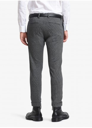 John Barritt man pants, slim fit, side pockets on the front side and welt pockets on back, finished edge on bottom. Stretch jersey fabric with micro pied-de-poule pattern. Color dark grey. Composition 62% cotton 35% polyester 3% elastane. Medium Grey Melange