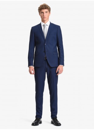 John Barritt man suit, slim fit, two buttons, double vent and amf. Lenght jacket 72 cm. Polyester/viscose stretch fabric. Color blue. Composition 79% polyester 20% viscose 1% elastane. Bluette