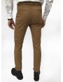 Man chinos pants, slim fit, in stretch cotton fabric, garment dyed . Caramel brown colour. Composition 97% cotton 3% elastane. Dark Brown